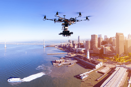 Drone Flying Above City