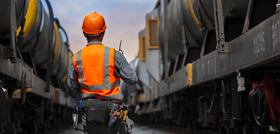 Rail Worker on Tracks
