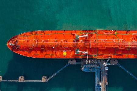 Cargo Ship Loading Chemicals at Port