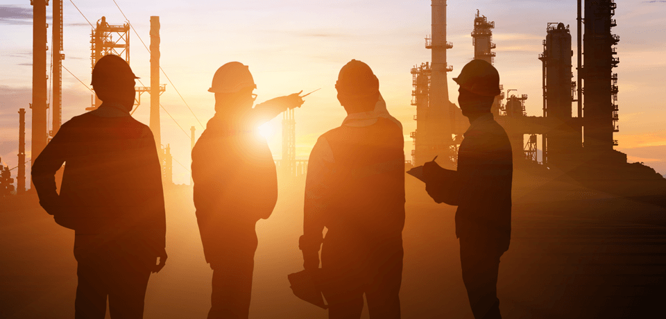 Employees Discuss Safety Measures at Dusk