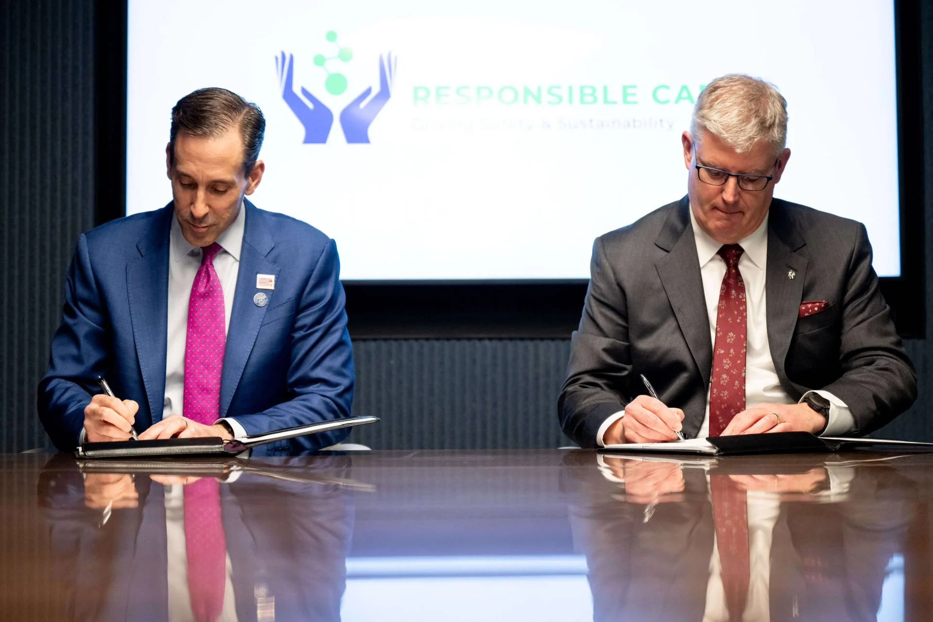 Chris Jahn and Greg Moffatt Sign MOU