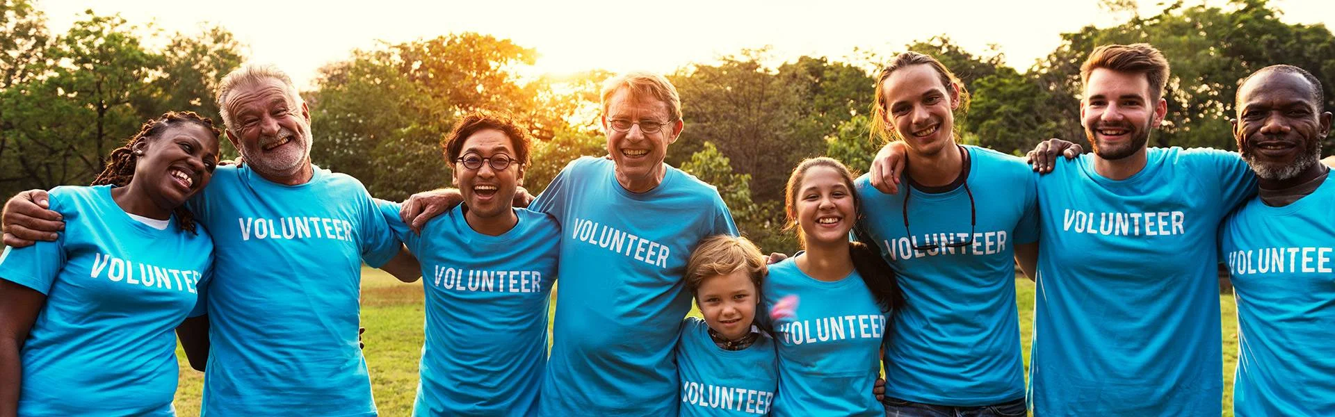 Voluteer group of people for charity donation in the park