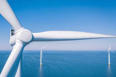 Wind Turbines Generating Electricity in Open Ocean