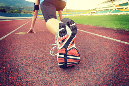 Runner Featuring Sole of Running Shoe