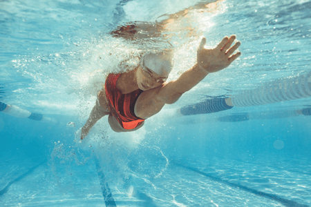 Swimmer in an Olympic Sized Pool