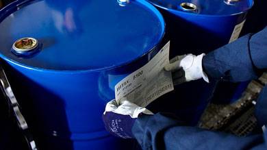 Afton Chemical Corporation Drums Being Labeled