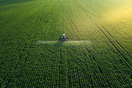 Aerial View Tractor Fertilizing Crop